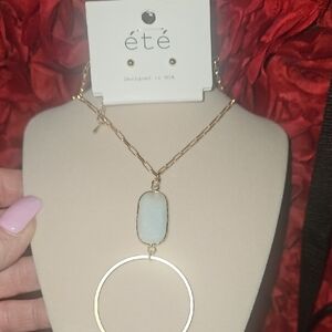 Gold and White Pendant Necklace
